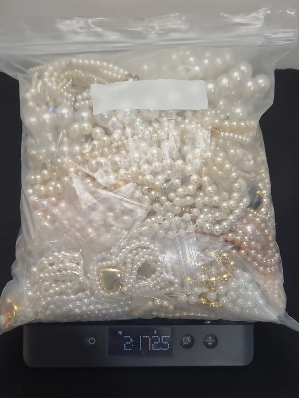 4.6 lbs of Faux Pearl Jewlery